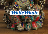 White Whale Brass Flamboyant Ganesha Sitting on a Lotus Pedestal in High Detailed Drapery